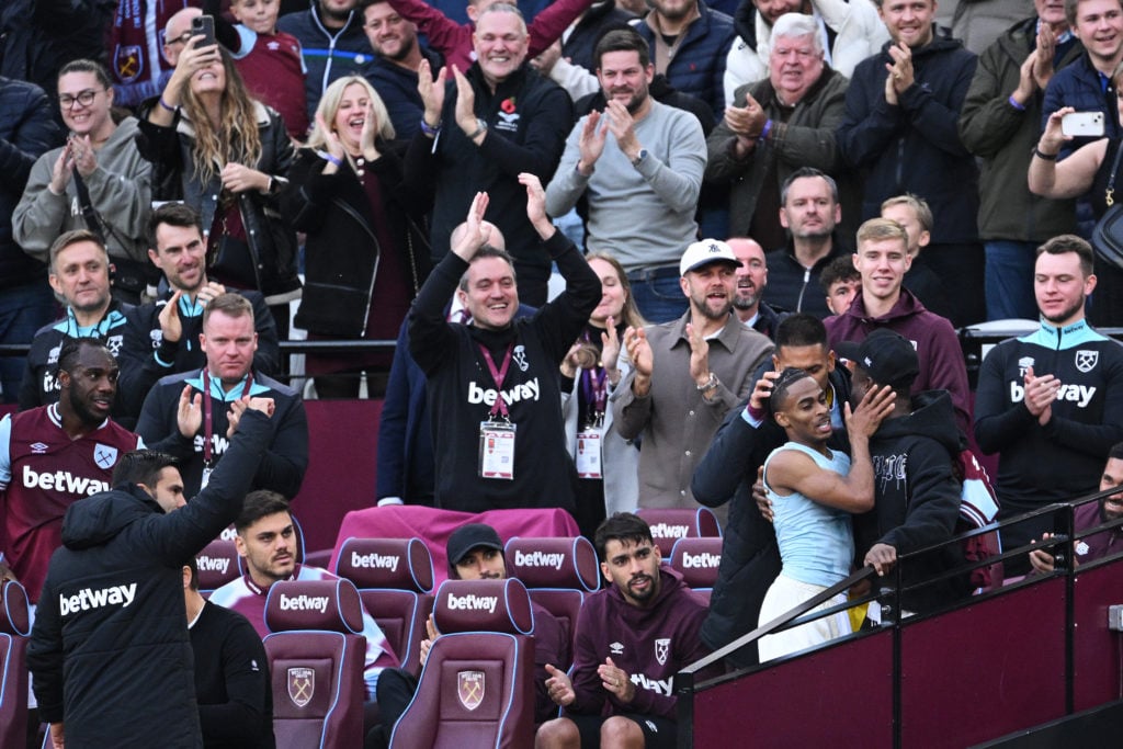 Crysencio Summerville of West Ham United celebrates scoring his team's first goal with teammate Mohammed Kudus, who is observing a suspension after...