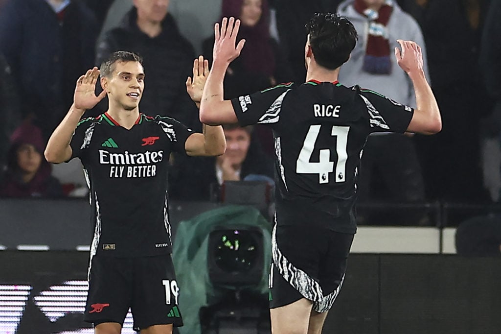 Arsenal's Belgian midfielder #19 Leandro Trossard (L) celebrates with Arsenal's English midfielder #41 Declan Rice (R) after scoring their second g...