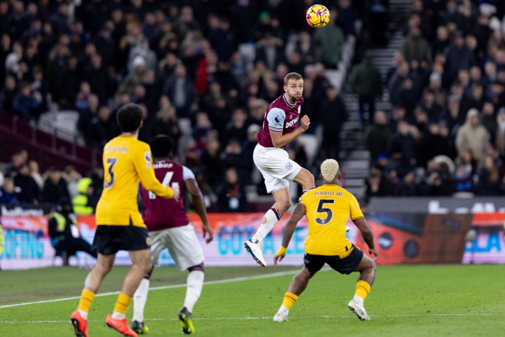 Tomas Soucek of West Ham United headers the ball during the Premier League match between West Ham United FC and Wolverhampton Wanderers FC at Londo...