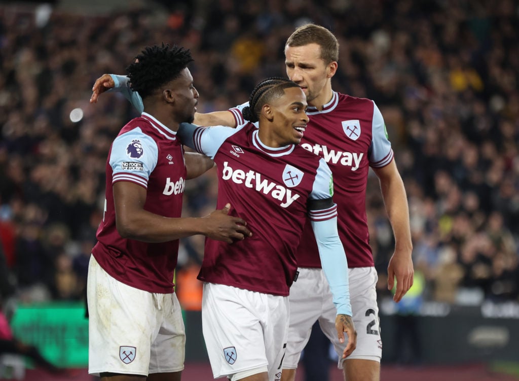 West Ham United's Mohammed Kudus celebrates scoring his side's first goal with Crysencio Summerville and Tomas Soucek during the Premier League mat...