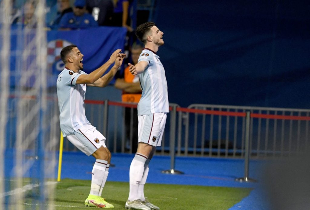 West Ham United's Declan Rice (R) celebrates with a teammate after scoring his team's first goal during the Europa League Group H match between GNK...