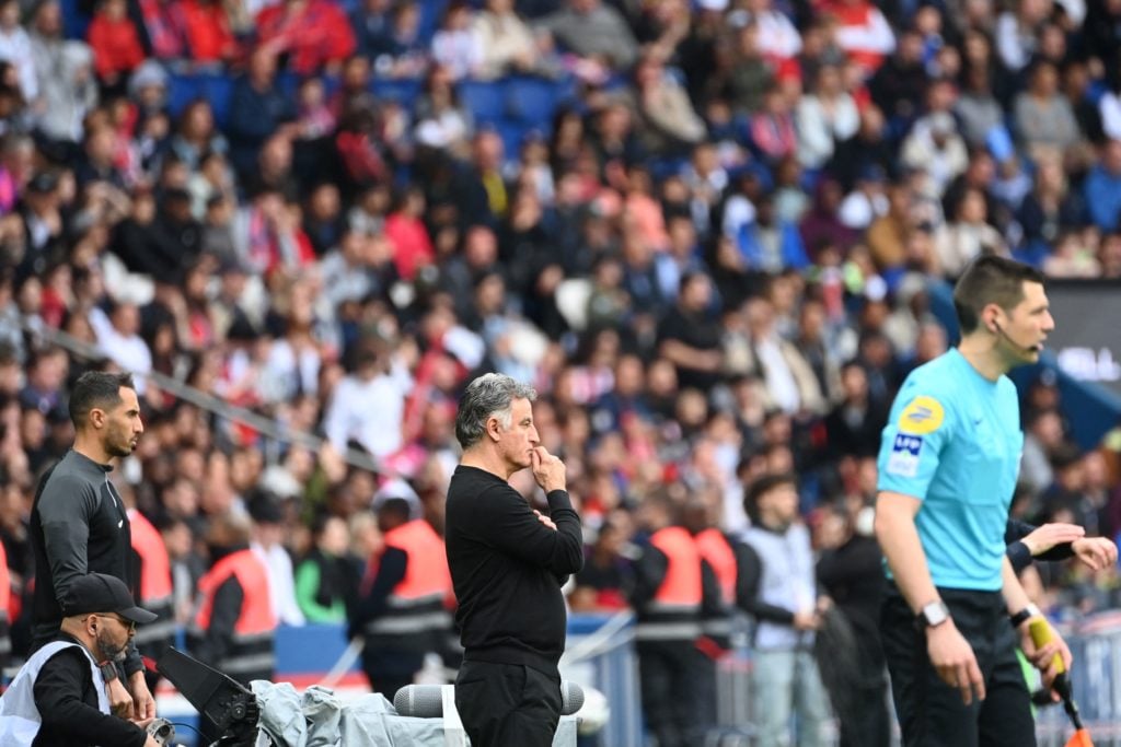 Paris Saint-Germain's French head coach Christophe Galtier (C) reacts during the French L1 football match between Paris Saint-Germain (PSG) and FC ...