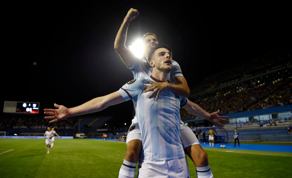 Declan Rice of West Ham United celebrates with Manuel Lanzini after scoring their side's second goal during the UEFA Europa League group H match be...