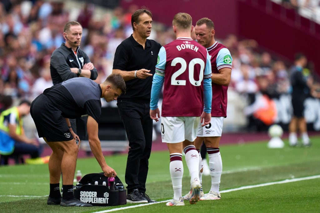 Julen Lopetegui, Manager of West Ham United gives instructions to his players Jarrod Bowen and Vladimir Coufal during the Pre-Season Friendly match...