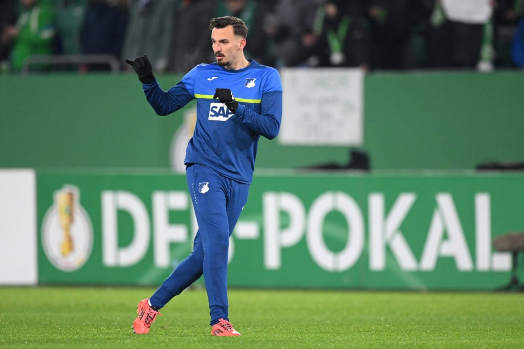 Mergim Berisha of TSG 1899 Hoffenheim warms up ahead of the DFB Cup round of 16 match between VfL Wolfsburg and TSG Hoffenheim at Volkswagen Arena ...