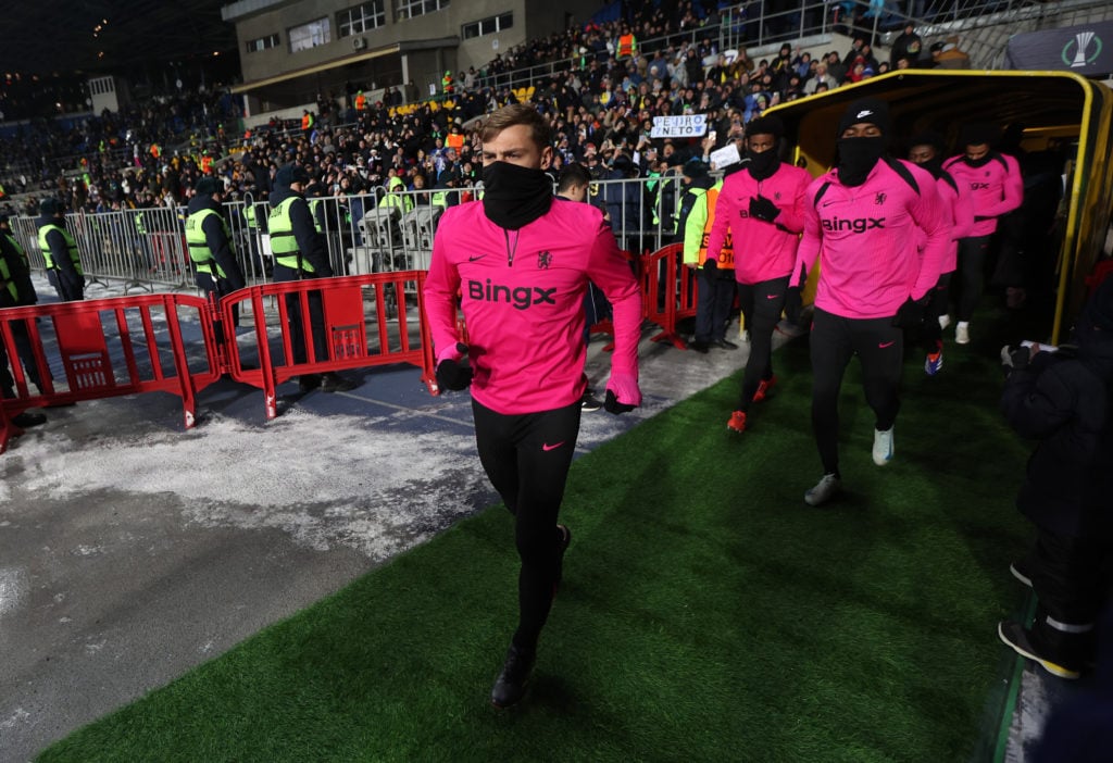 Kiernan Dewsbury-Hall of Chelsea looks on as he walks out of the tunnel to warm up with teammates prior to the UEFA Conference League 2024/25 Leagu...