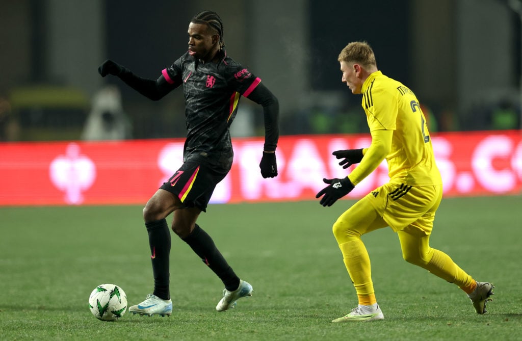 Carney Chukwuemeka of Chelsea runs with the ball whilst under pressure from Alexandr Maroch of Astana during the UEFA Conference League 2024/25 Lea...