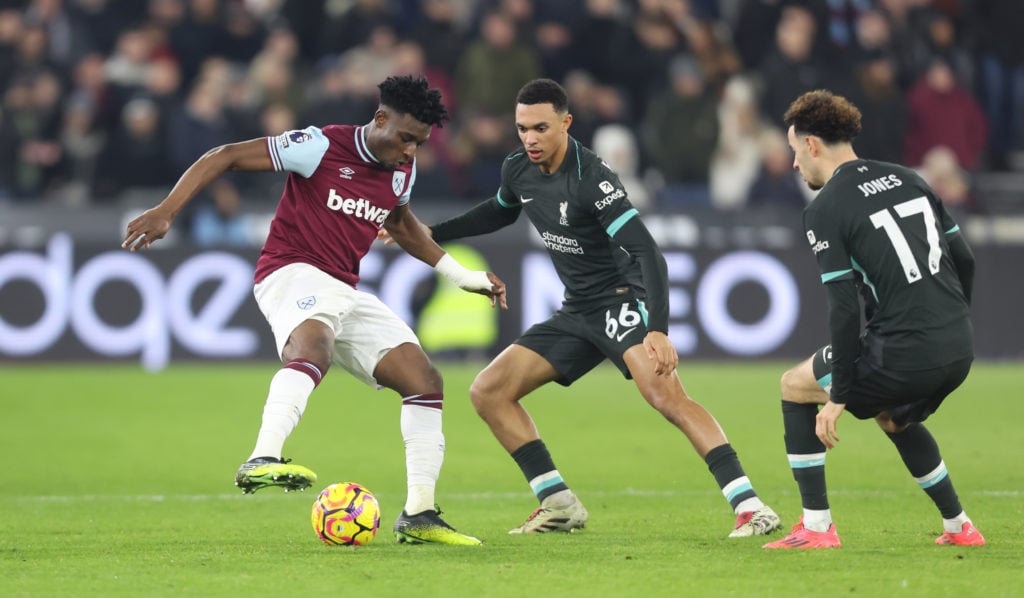 West Ham United's Mohammed Kudus up against Liverpool's Trent Alexander-Arnold and Curtis Jones during the Premier League match between West Ham Un...