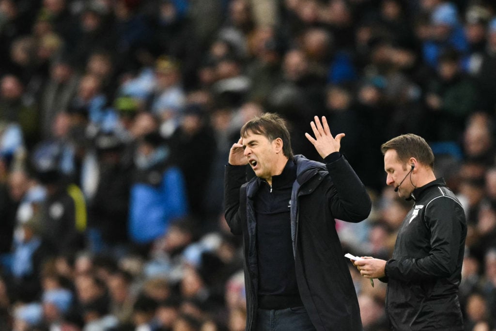 West Ham United's Spanish manager Julen Lopetegui (L) reacts during the English Premier League football match between Manchester City and West Ham ...