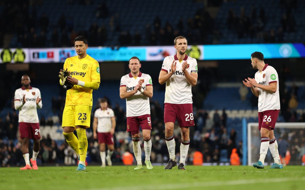 Alphonse Areola and Tomas Soucek of West Ham United applau the fans after the team's defeat during the Premier League match between Manchester City...