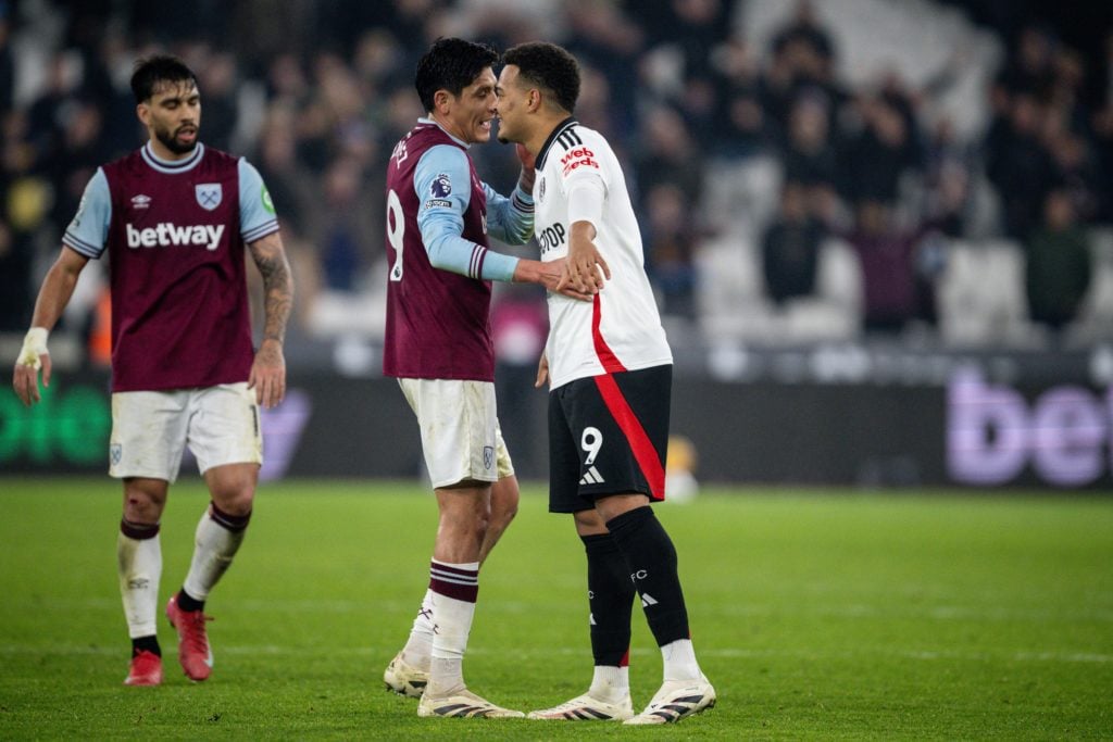 Edson Alvarez of West Ham United and Rodrigo Muniz of Fulham during the Premier League match between West Ham United FC and Fulham FC at London Sta...