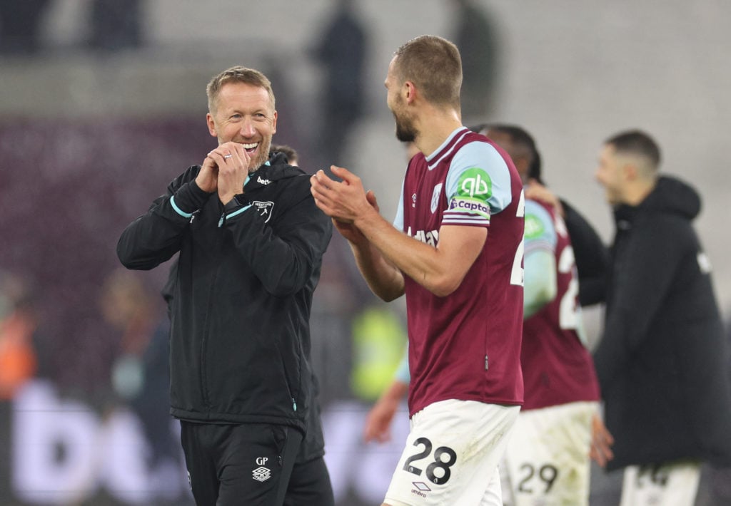 Graham Potter, Head Coach of West Ham United, and Tomas Soucek of West Ham United celebrate victory after the Premier League match between West Ham...