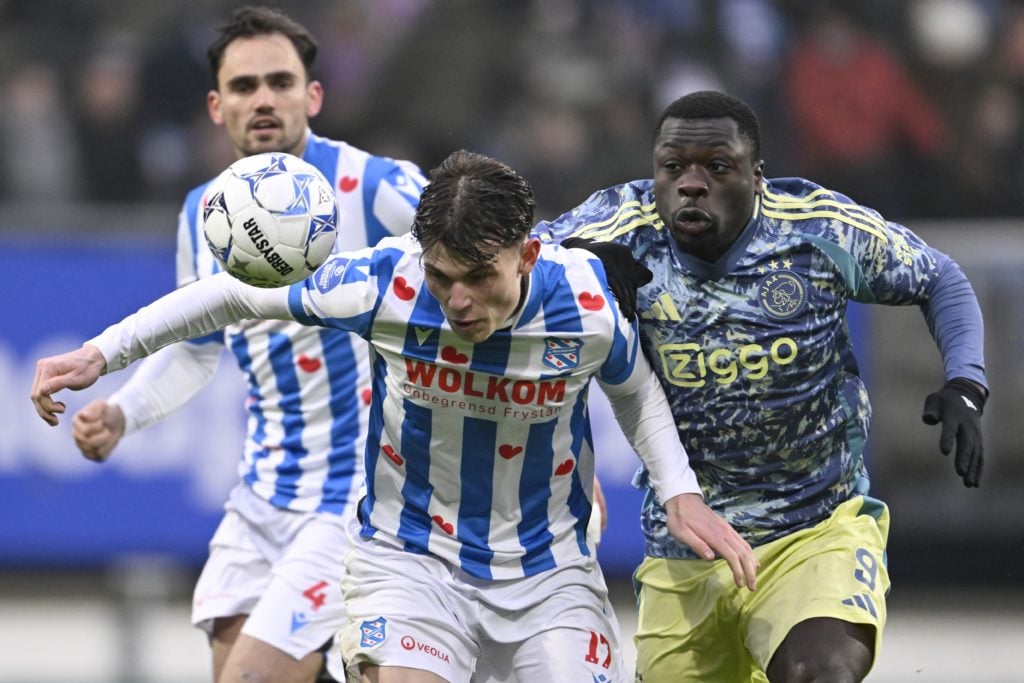 HEERENVEEN - (l-r) Nikolai Hopland of sc Heerenveen, Brian Brobbey of Ajax during the Dutch Eredivisie match between sc Heerenveen and AFC Ajax at ...