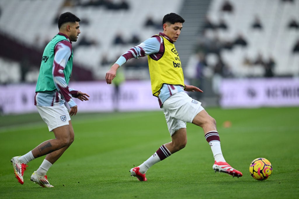 Emerson Palmieri and Edson Alvarez of West Ham United warms up prior to the Premier League match between West Ham United FC and Crystal Palace FC a...