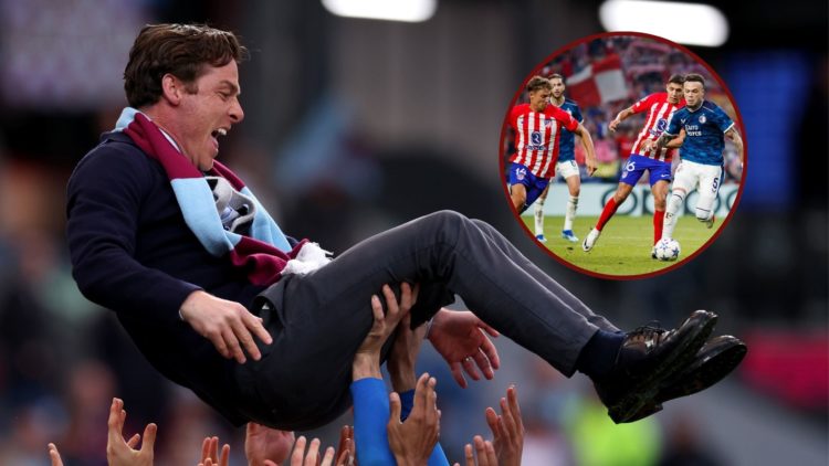 Main image, The players of Burnley lift Scott Parker, Manager of Burnley, into their air as they celebrate victory and subsequent promotion to the ...