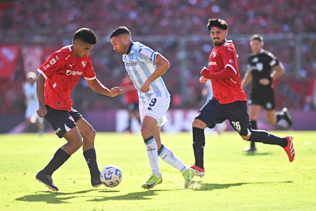 Kevin Lomonaco and Sebastian Valdez in action during Independiente v Racing Club in the Torneo Apertura Betano 2025