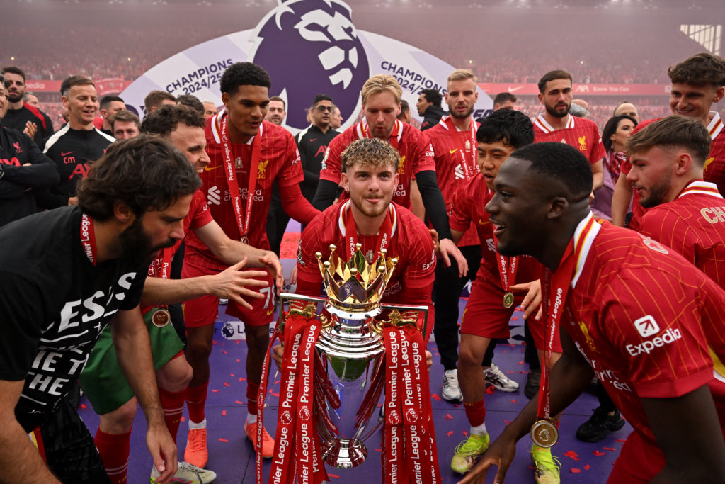 Harvey Elliott lifts the Premier League trophy after Liverpool FC v Crystal Palace FC