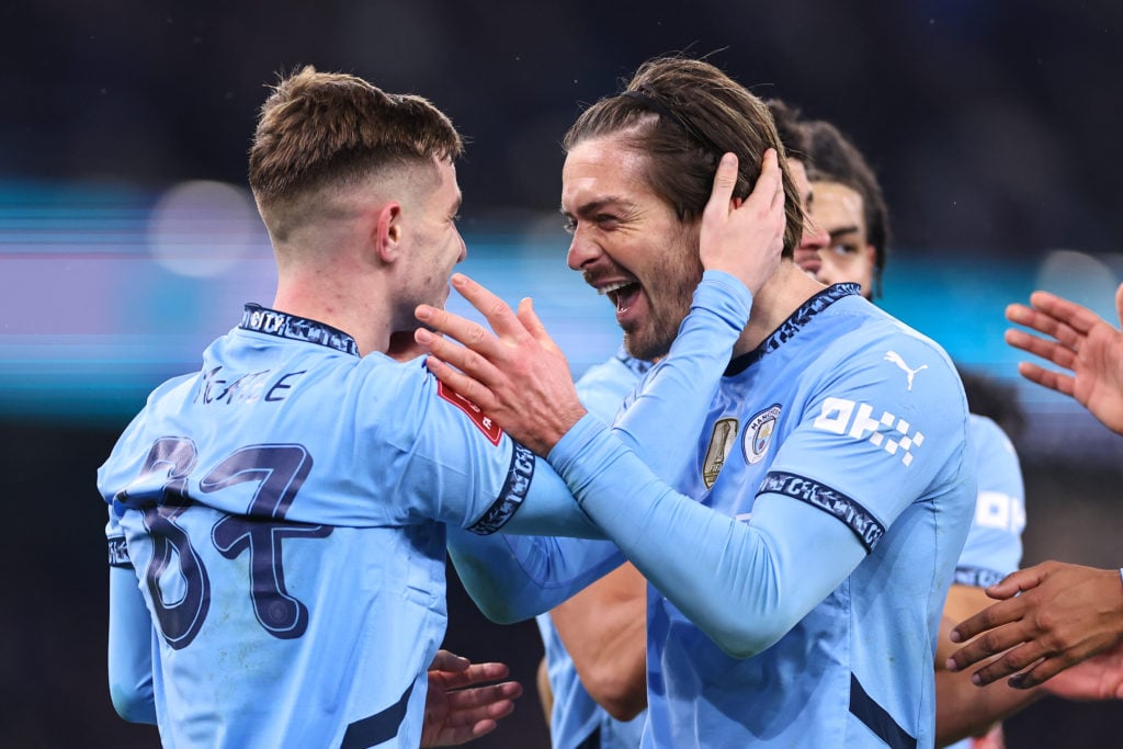 James McAtee and Jack Grealish celebrate scoring for Manchester City