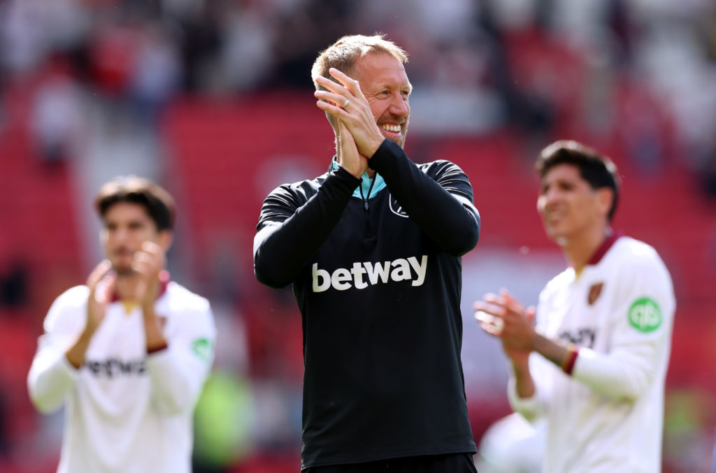 Graham Potter applauds West Ham fans after a win at Man United