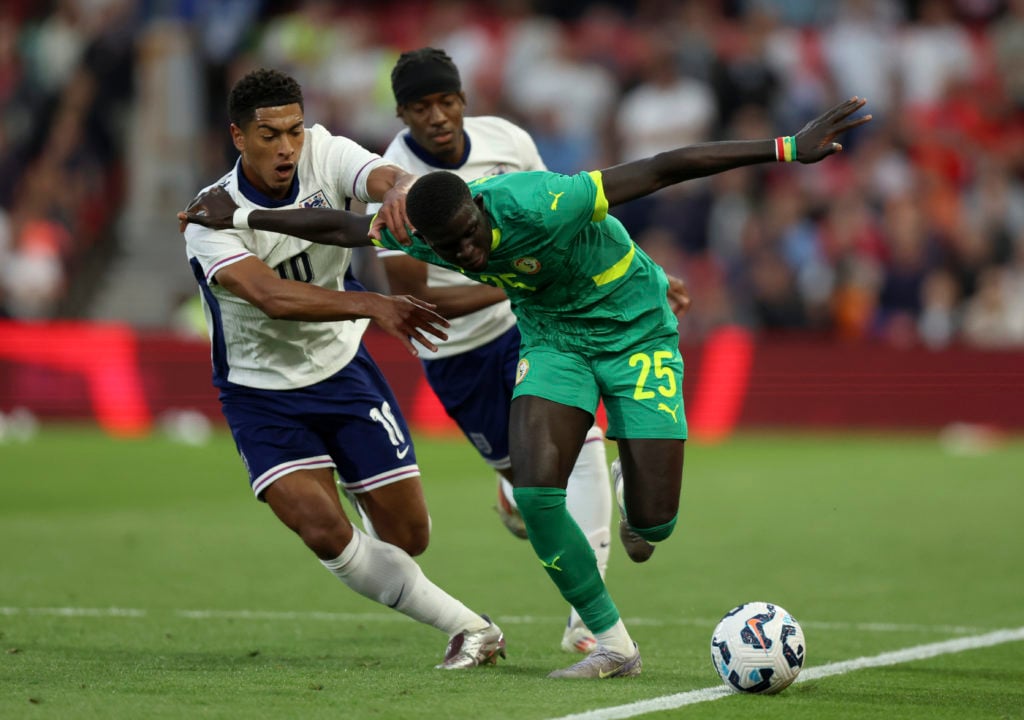 Jude Bellingham struggles to contain El Hadji Malick Diouf in England's defeat to Senegal