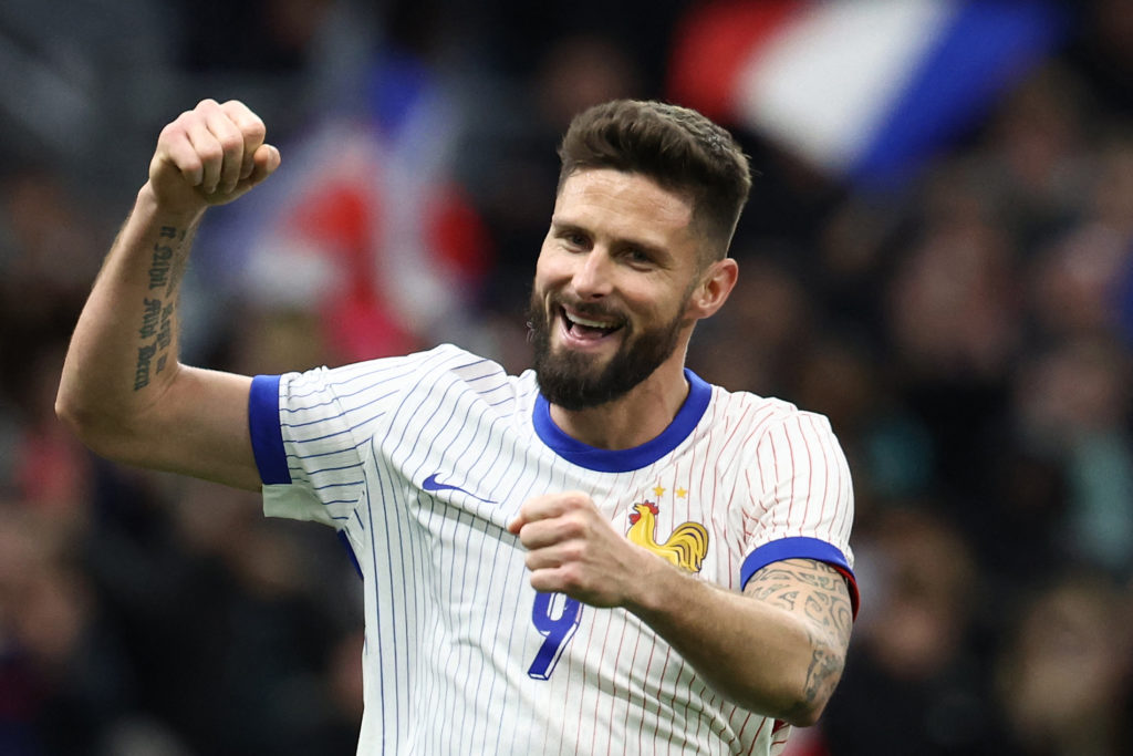 Olivier Giroud celebrates in a France shirt