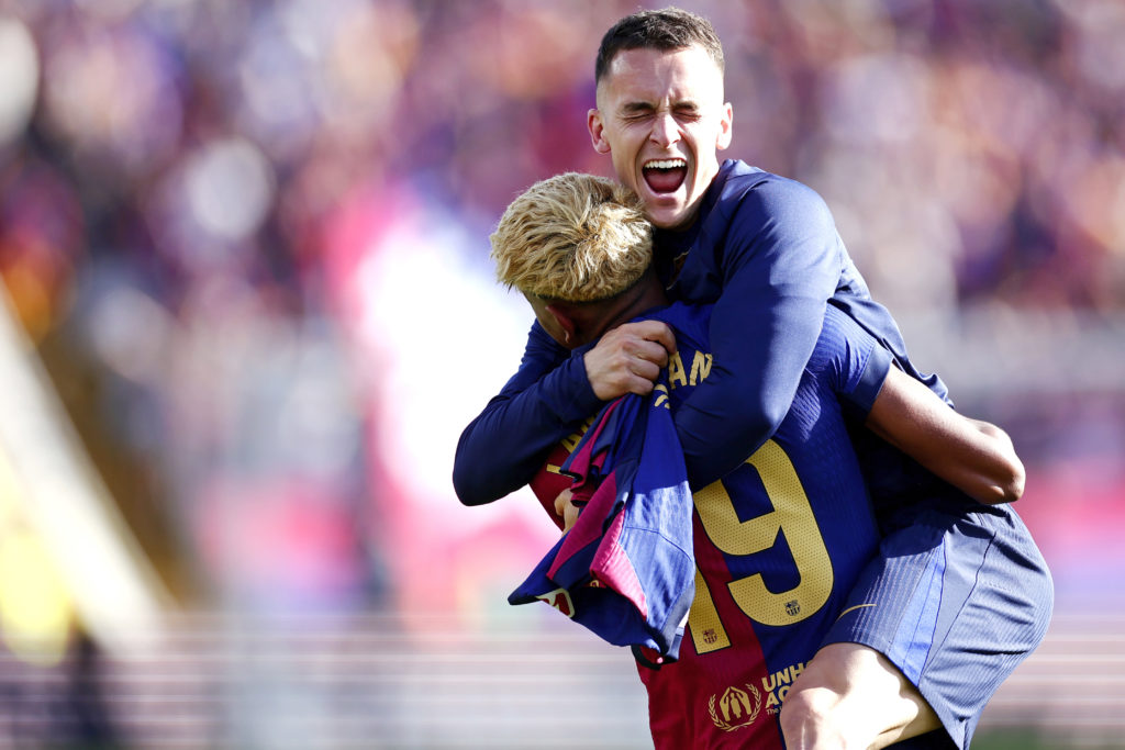 Marc Casado and Lamine Yamal celebrate during FC Barcelona v Real Madrid - LaLiga EA Sports