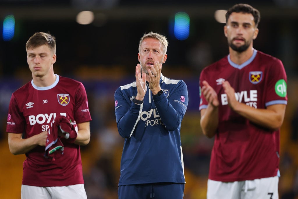 Graham Potter applauds West Ham fans after the Carabao Cup defeat to Wolves