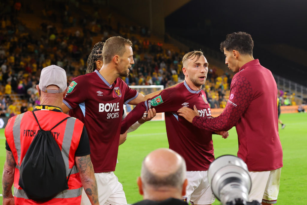 Jarrod Bowen confronts a West Han fan after the cup defeat at Wolves