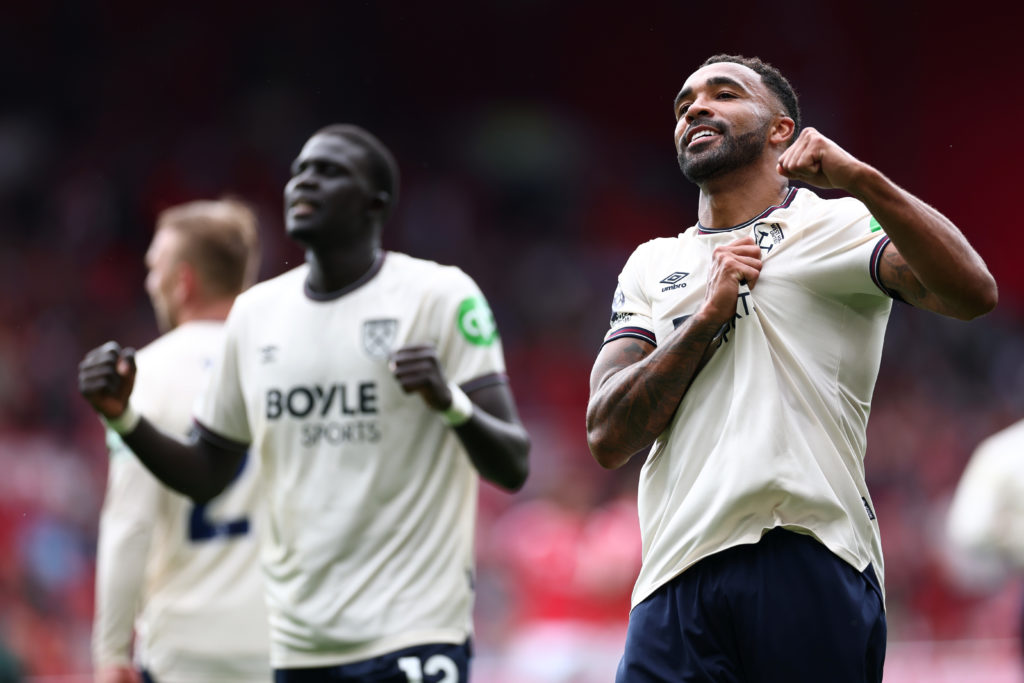 Callum Wilson celebrates his first West Ham goal and win by pulling at the Hammers badge