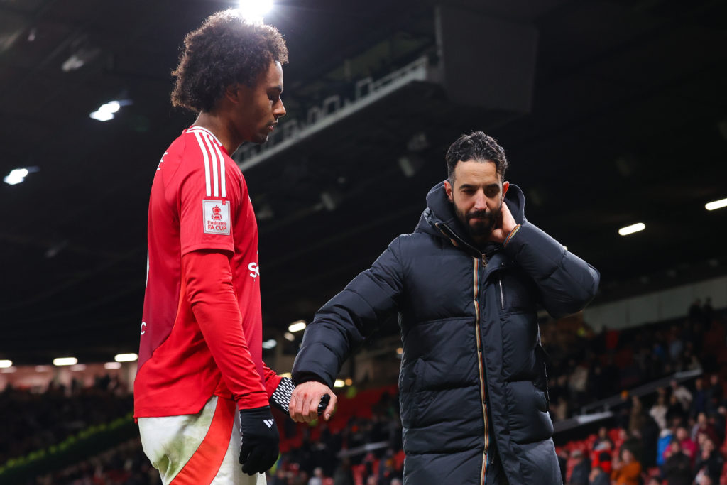 Ruben Amorim holds hands with Manchester United star Joshua Zirkzee