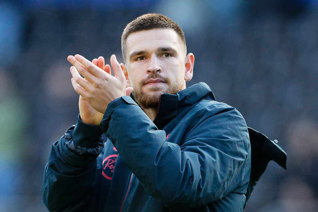 Swansea star Zan Vipotnik applauds the club's fans