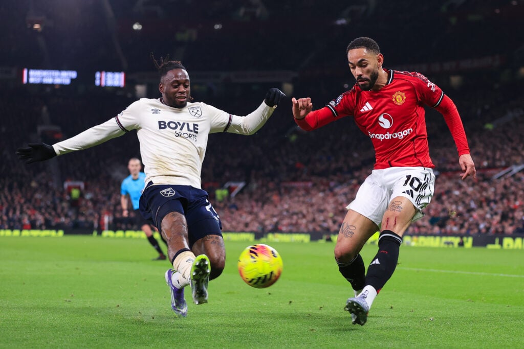 Aaron Wan-Bissaka vs Matheus Cunha during Manchester United v West Ham United - Premier League