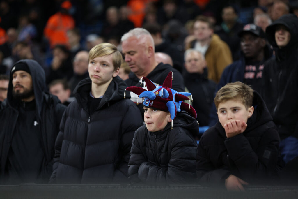 West Ham fans look bored stiff during the defeat to Manchester City at the Etihad