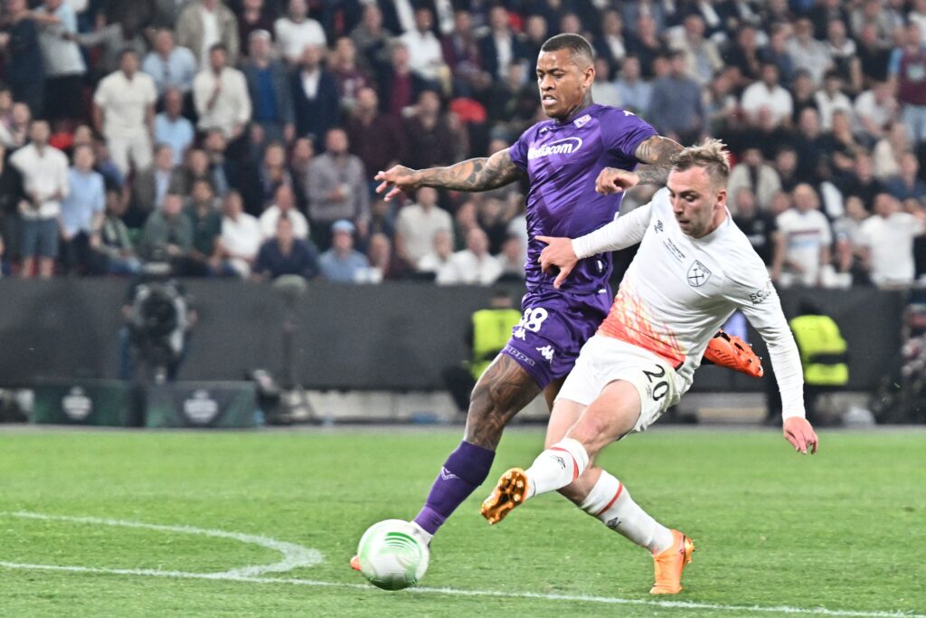 Jarrod Bowen scores for West Ham in the Conference League final while Igor Julio tries to stop him.