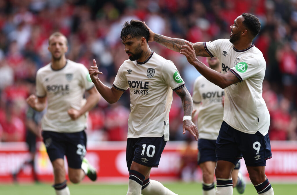 Callum Wilson celebrates with Lucas Paqueta after West Ham score against Nottingham Forest.