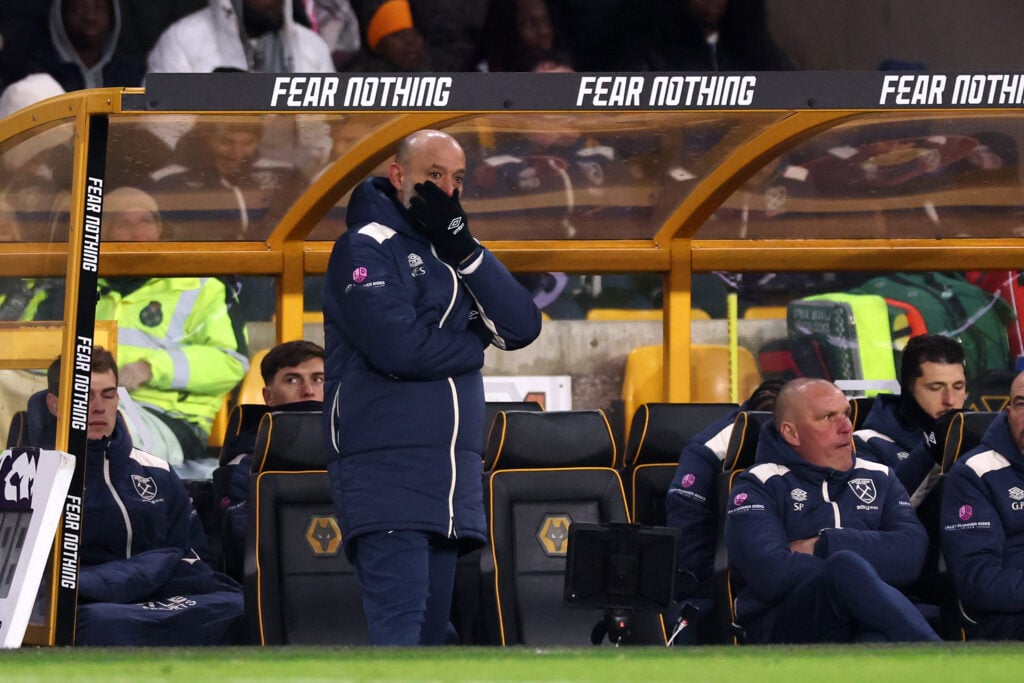 Nuno Espirito Santo looks dejected in the dugout as West Ham lose to his old club Wolves