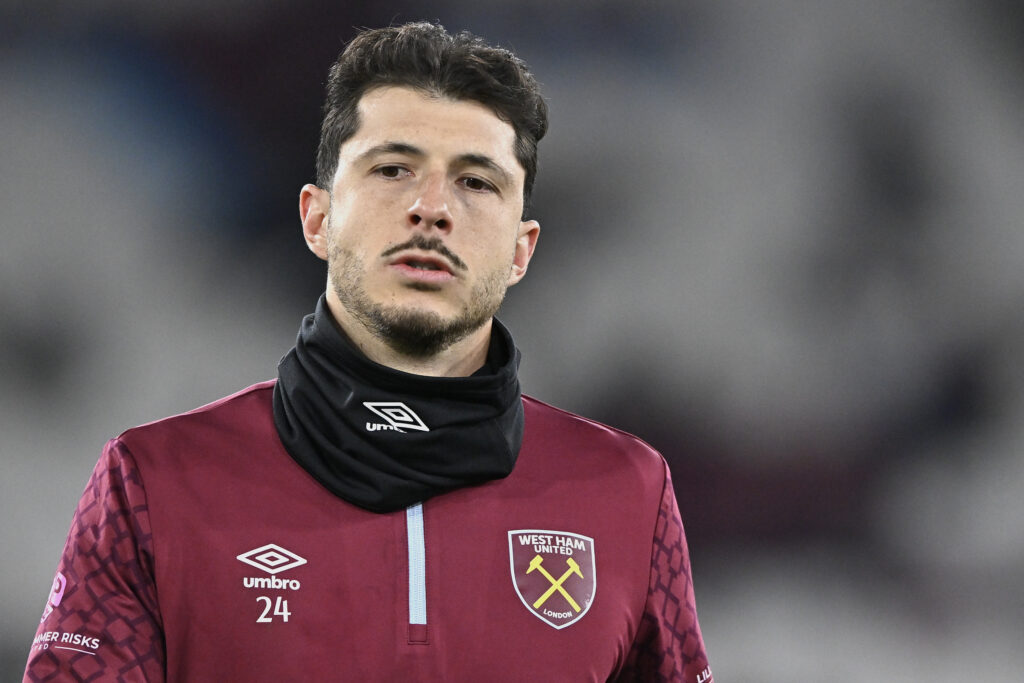 Guido Rodriguez warms up before West Ham play against Nottingham Forest.
