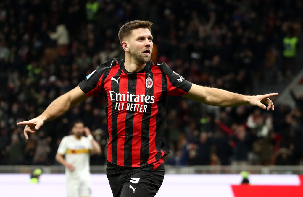 Niclas Fullkrug celebrates after scoring for AC Milan against Leece.