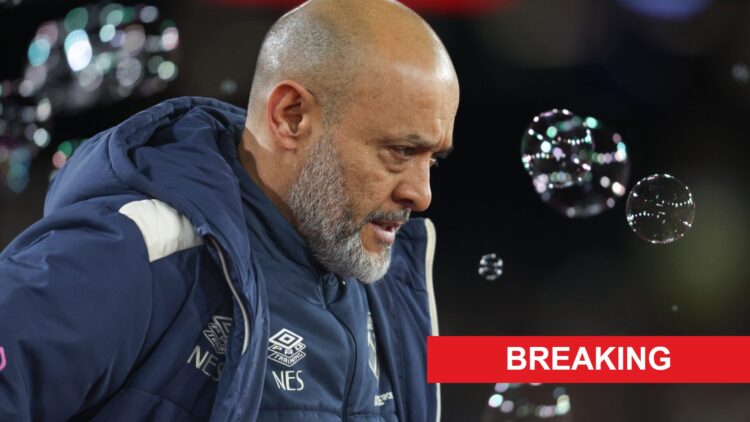 Nuno Espirito Santo looks down in dejection.