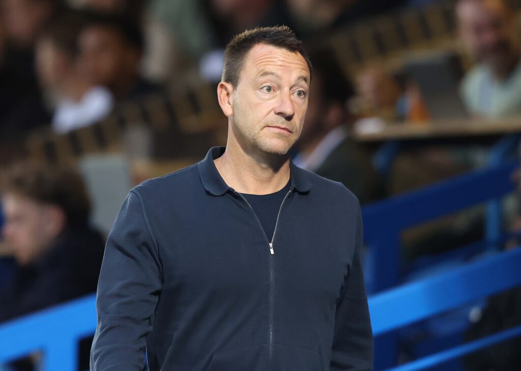 John Terry watches on from the stands during Chelsea's Premier League 2 match against Manchester City.