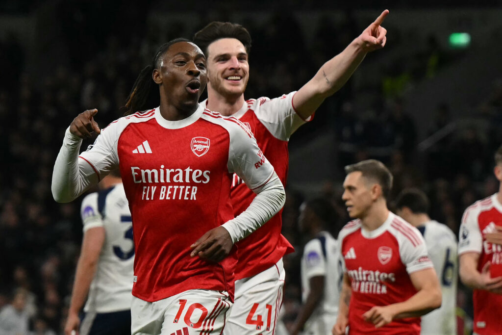 Eberechi Eze (L) celebrates Arsenal's win over Spurs with former West Ham star Declan Rice