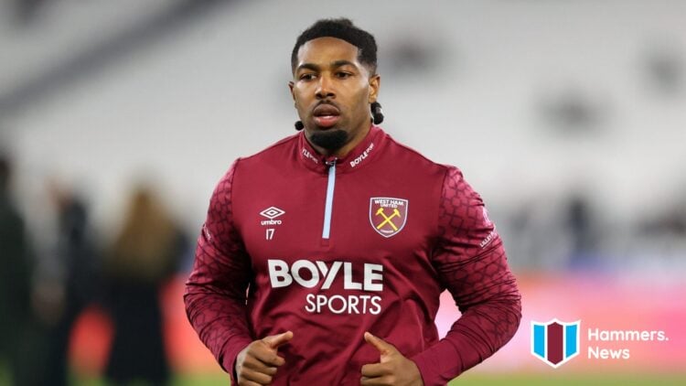 Adama Traore warms up prior to West Ham United's game with Manchester United.