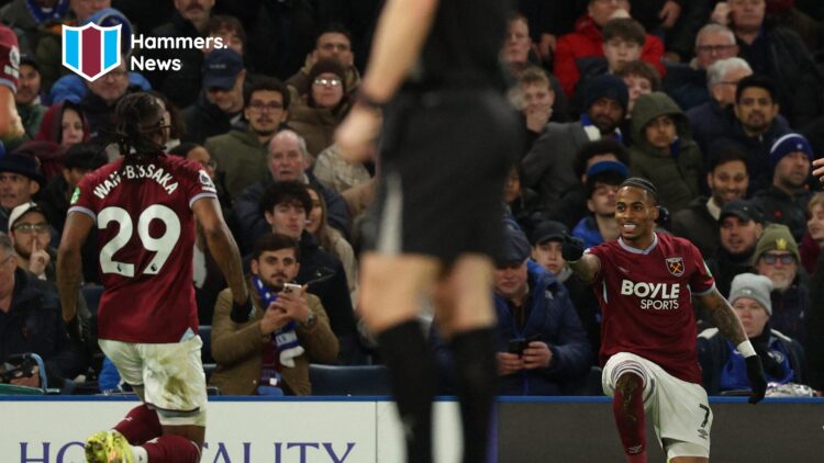 Crysencio Summerville celebrates with Aaron Wan-Bissaka after scoring for West Ham against Chelsea. A 'Hammers News' site logo has been added.