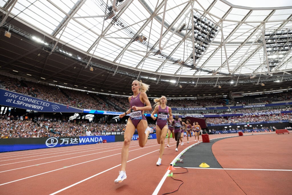 Keely Hodgkinson leads Jemma Reekie into the last lap of the 800m during the London Diamond League at the London Stadium