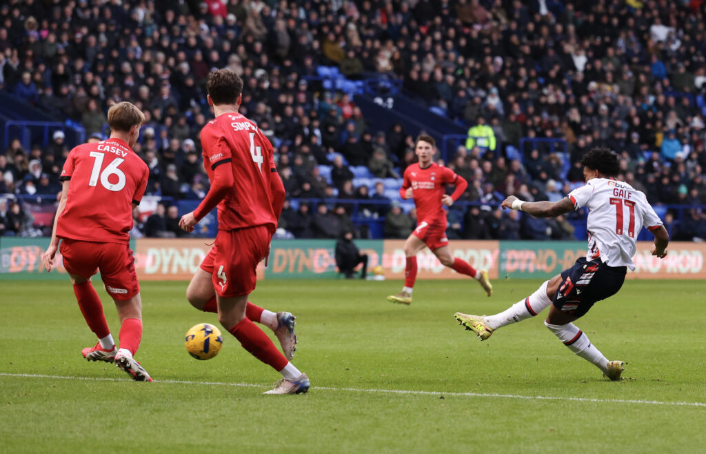 Bolton Wanderers' Thierry Gale shoots for goal despite the attentions of Leyton Orient's Kaelan Casey during a Sky Bet League One match
