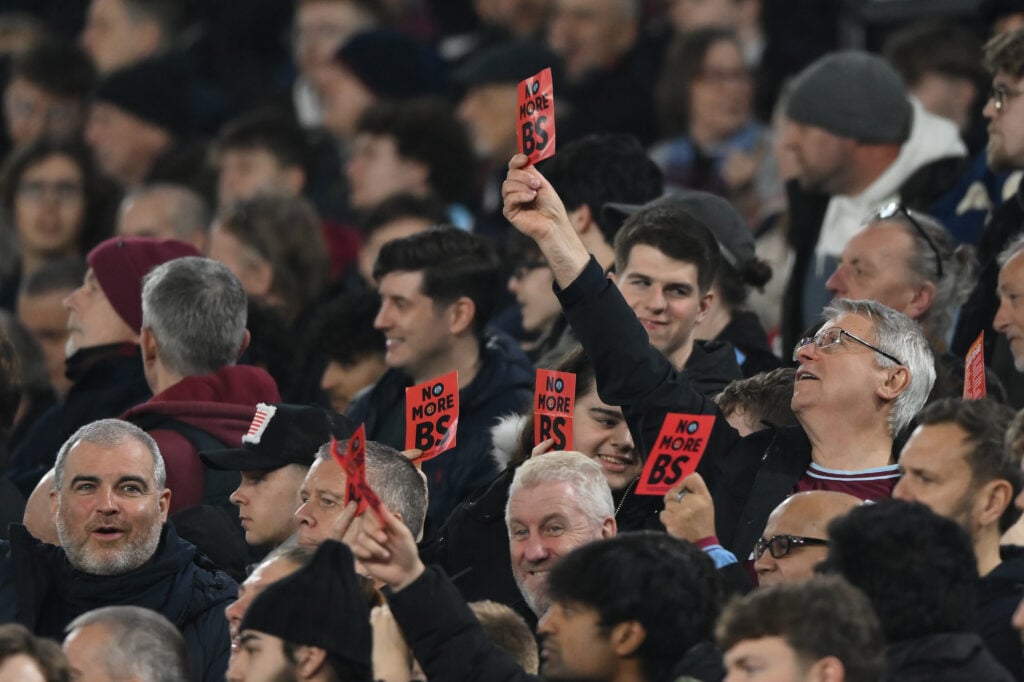 Fans protest against the board members during the Emirates FA Cup Fifth Round match between West Ham United and Brentford.