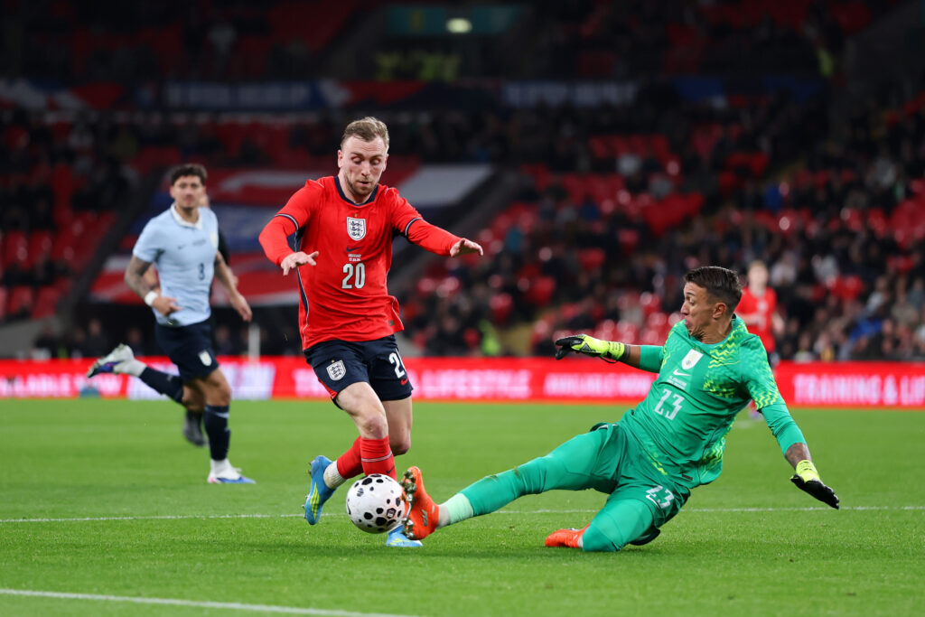 Jarrod Bowen of England is challenged by Fernando Muslera of Uruguay during the international friendly match between England and Uruguay