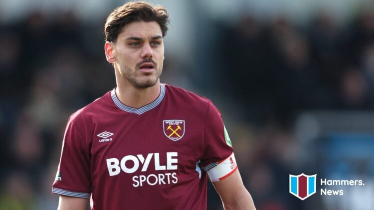 Konstantinos Mavropanos playing for West Ham United against Burton Albion. A 'Hammers News' site logo has been added.