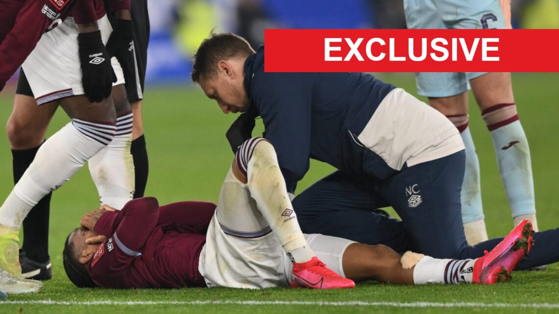 Crysencio Summerville covers his face after suffering an injury in West Ham's FA Cup win over Brentford