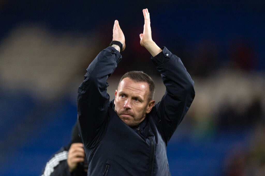 Craig Bellamy acknowledges the crowd after a 2026 World Cup qualifier between Wales and North Macedonia.